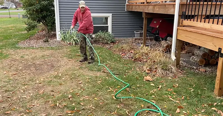 Siphoning Water From A Pool With A Garden Hose