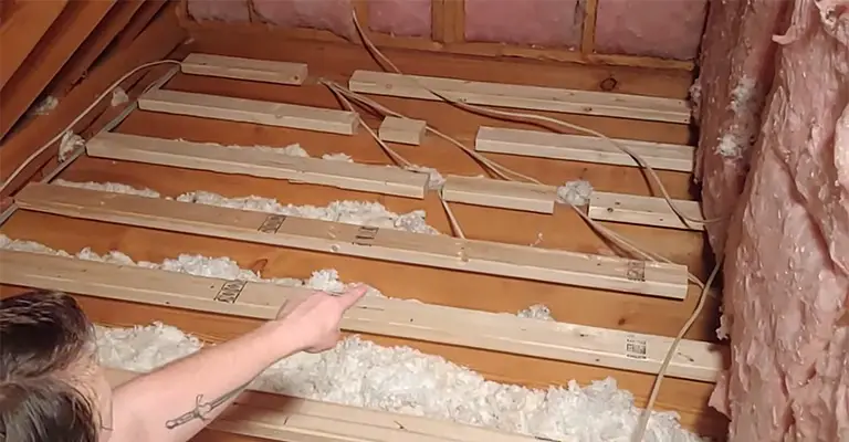 Can You Lay Insulation Over Electrical Wires In The Attic