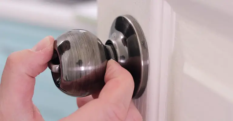 How To Remove A Commercial Door Knob Without Visible Screws