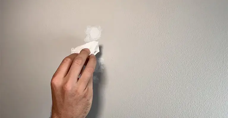 Getting Shiny Wipe Marks Off of Matte Walls