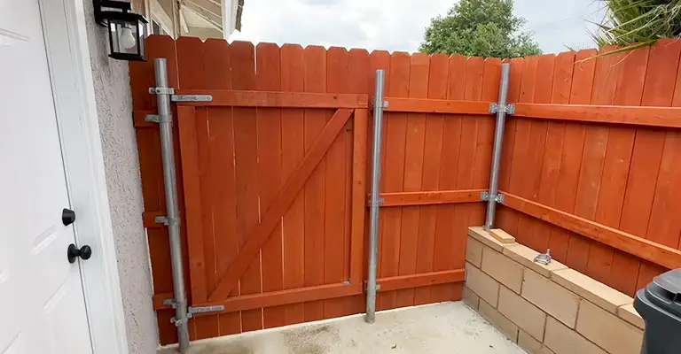 How To Hang A Wooden Gate On A Metal Post