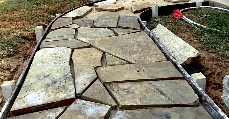Pouring Concrete Over Flagstones