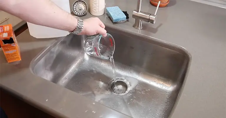 How To Unclog Drain With Baking Soda & Vinegar
